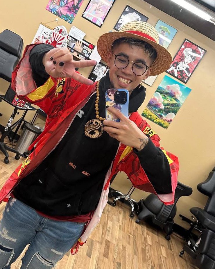LoLo in a straw hat at Local Roots Ink