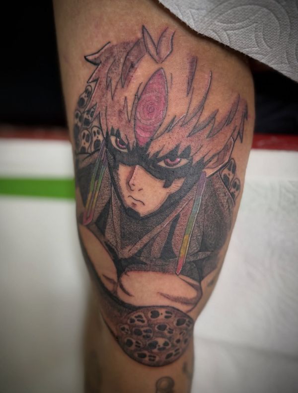 Evil Eye portrait tattoo by LoLo, on the upper arm
