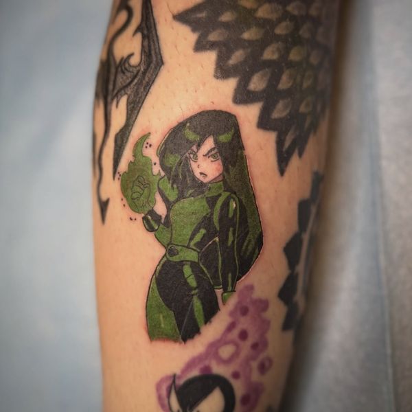 Shego flash tattoo by LoLo, on the forearm