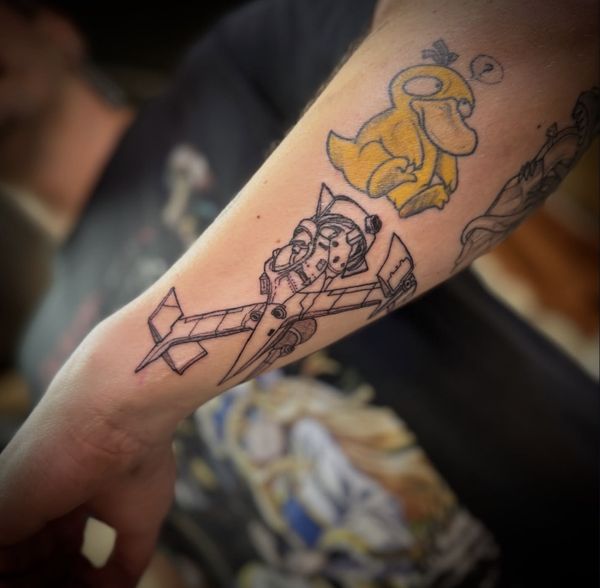 Mecha panel tattoo by LoLo, on the forearm