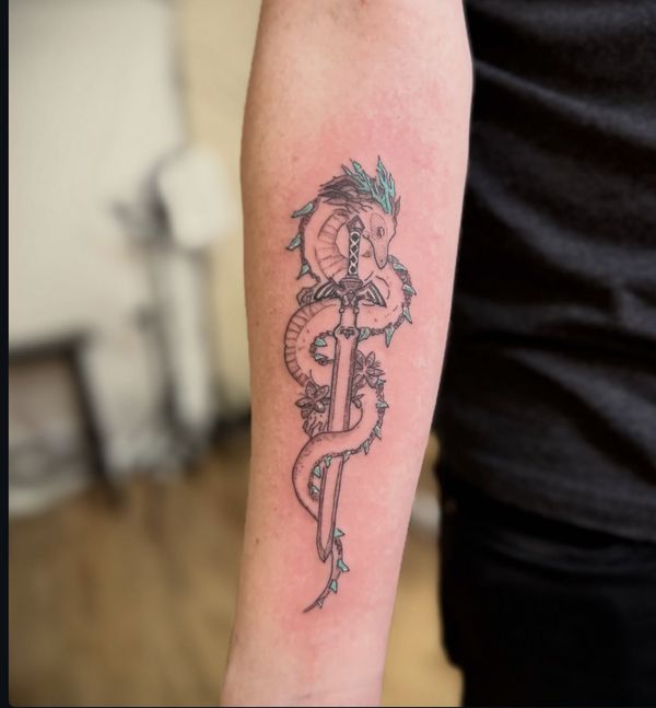Legend of Zelda tattoo by LoLo, on the forearm