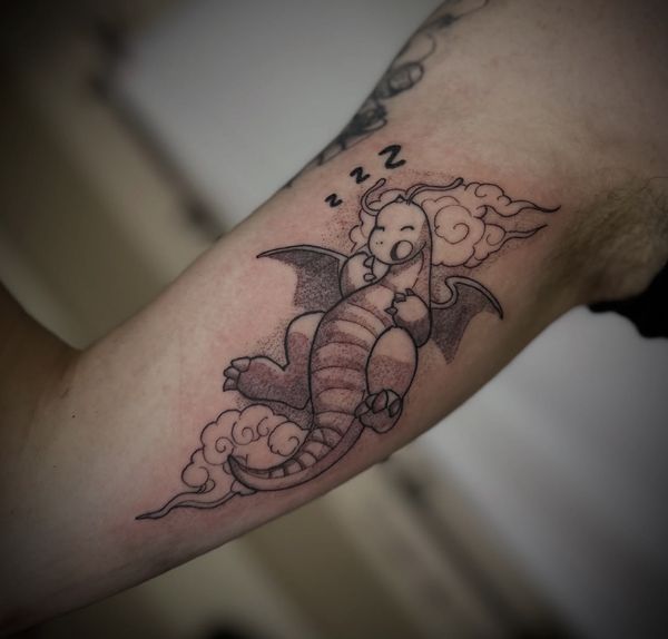 Dragonite Pokemon tattoo by LoLo, on the inner arm