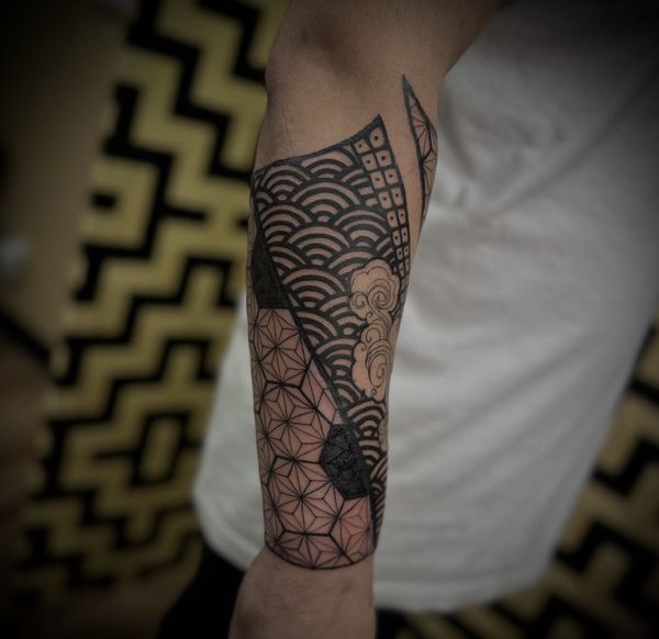 Geo Japanese tattoo by LoLo, on the forearm