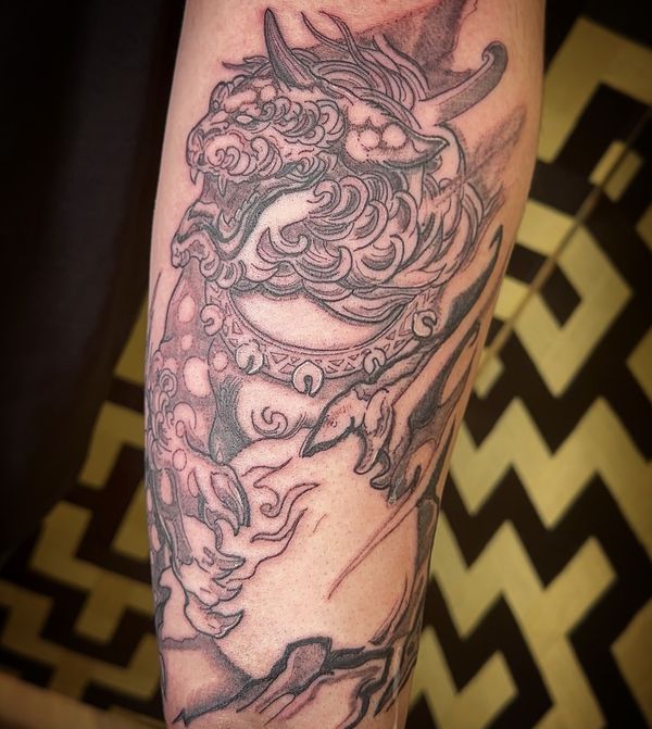 Japanese foo dog tattoo by LoLo, on the forearm